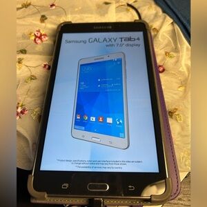 Samsung Galaxy Tab 4 Tablet in Black with Purple Case